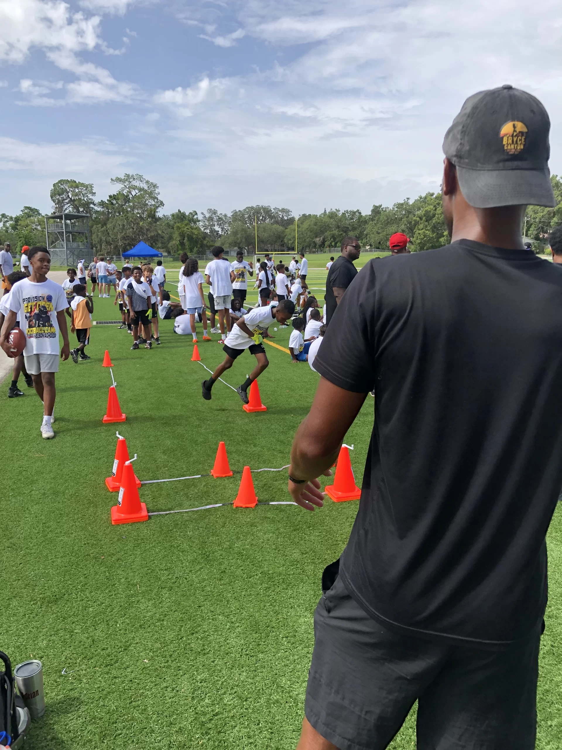 Adventurer showcasing the versatility of self-retractable athletic cones in the stunning mountains